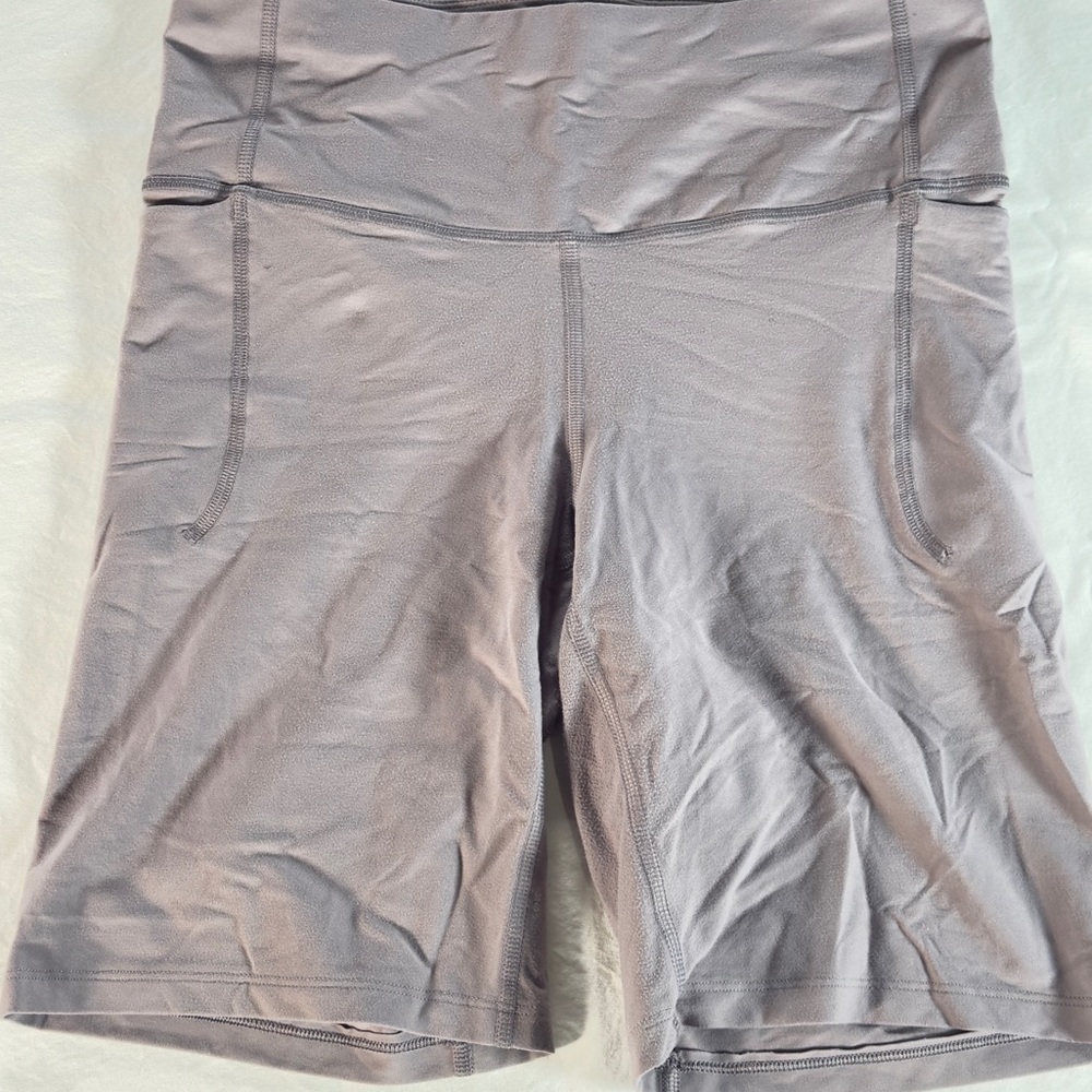Under Armour Women’s High-Waist Biker Shorts in Dusty Lavender